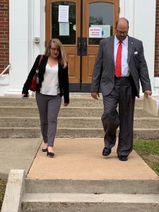 R&L walking out of court